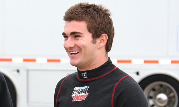 Connor De Phillippi shares a laugh with his team