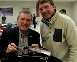 Johnny Rutherford signing autographs at IMS Museum