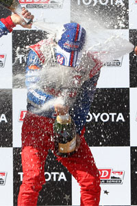 Champagne Spray on Takuma Sato