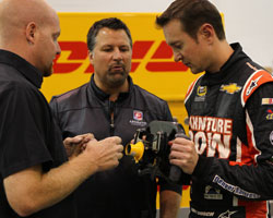 Kurt Busch looking over steering wheel