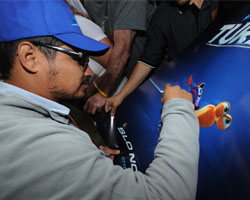 Michael Pena signing autographs