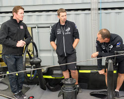 Scott Dixon with members of New Zealand's America's Cup team