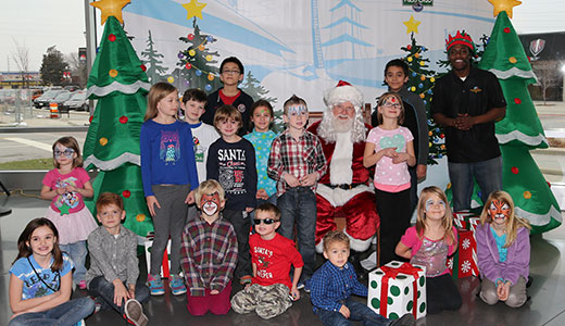 Kids visit Santa Claus at Dallara Factory