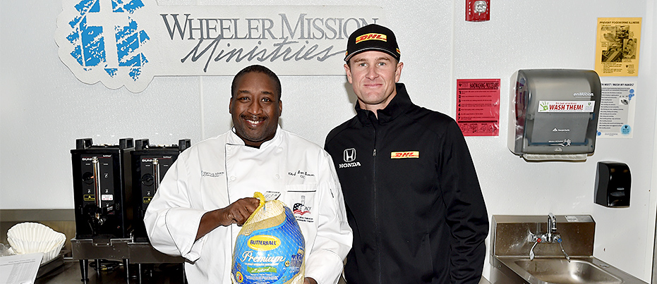 Ryan Hunter-Reay makes donation to Wheeler Mission.