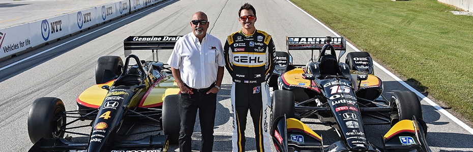 Bobby and Graham Rahal with similar livery cars at Road America