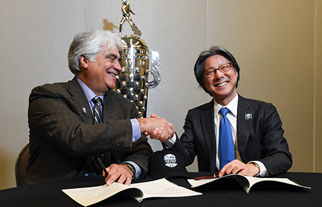 NTT signing at Detroit's auto show