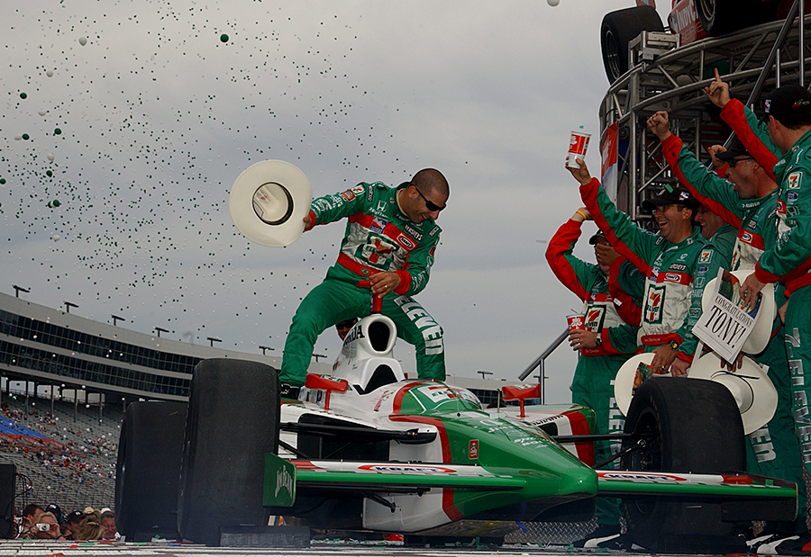 Tony Kanaan celebrates his 2004 NTT IndyCar Series title in Texas-style.