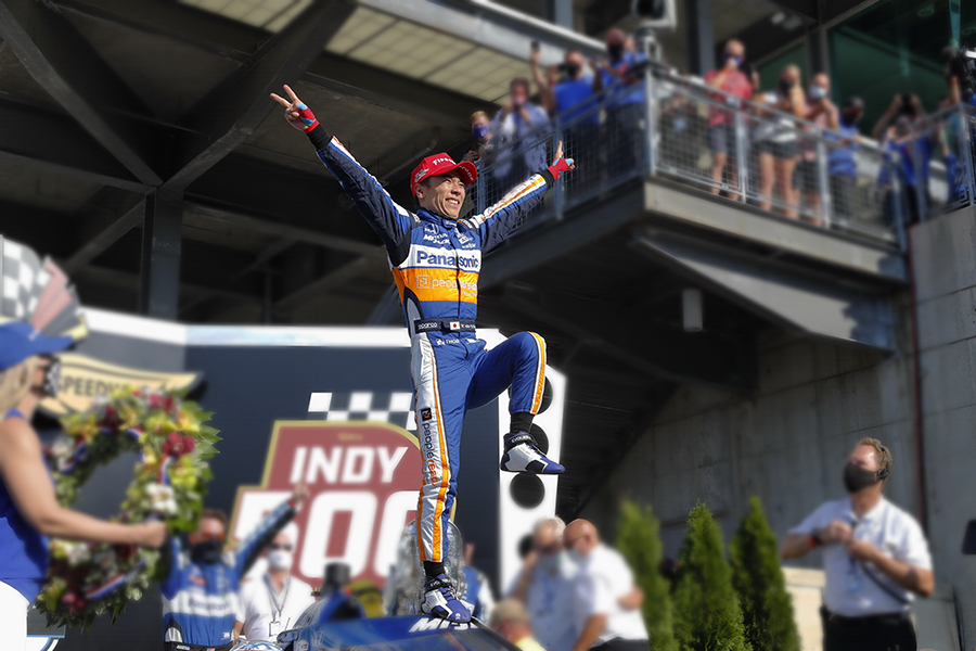 Takuma Sato celebrates