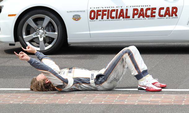 Wheldon celebrating his unforgettable victory in 2011