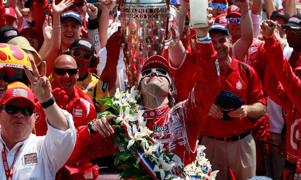Dario Salutes Wheldon With Milk