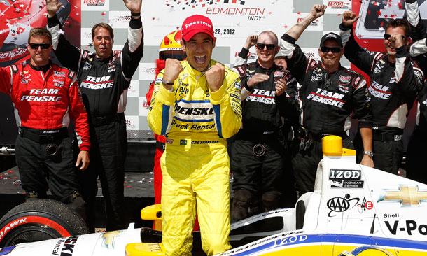 Helio Castroneves celebrates with team