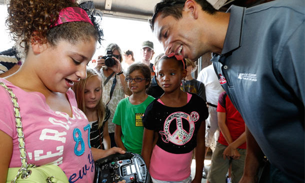Justin Wilson demonstrates his steering wheel