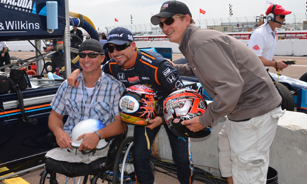 Alex Tagliani shows helmet at St. Pete