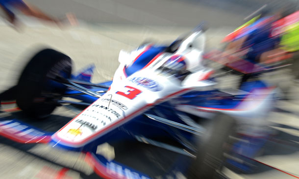 Helio Castroneves leaving pit lane