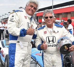 Andretti gives Leno a quick tour of racetrack
