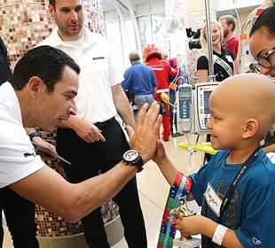 Smiles are plentiful as INDYCAR drivers visit Riley Hospital for Children