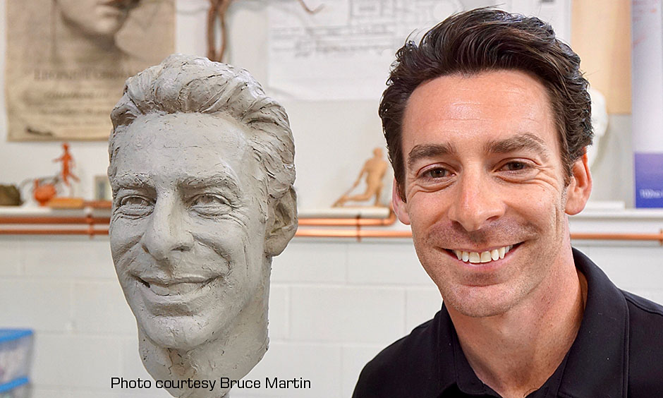Simon Pagenaud and his scuplted head for the Borg-Warner Trophy
