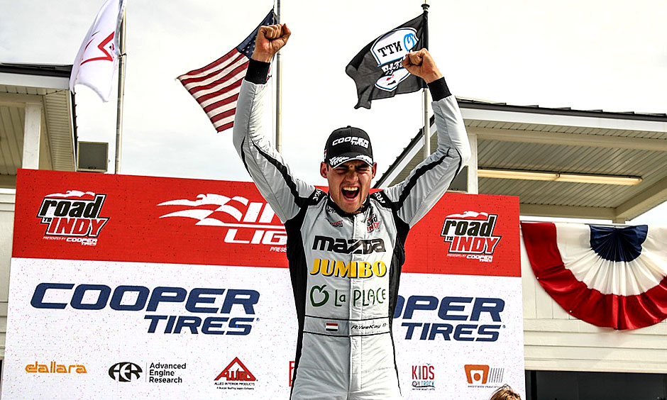 Rinus Veekay celebrates a win at Road America