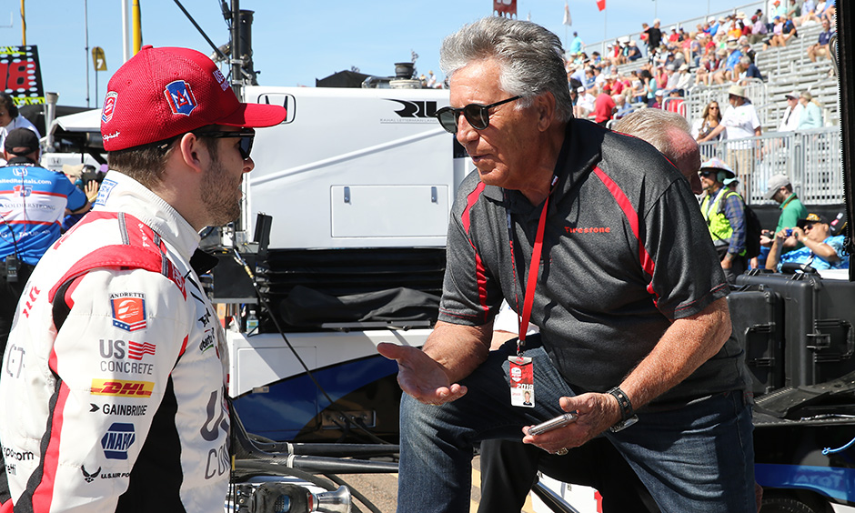 Mario Andretti talks with Michael Andretti