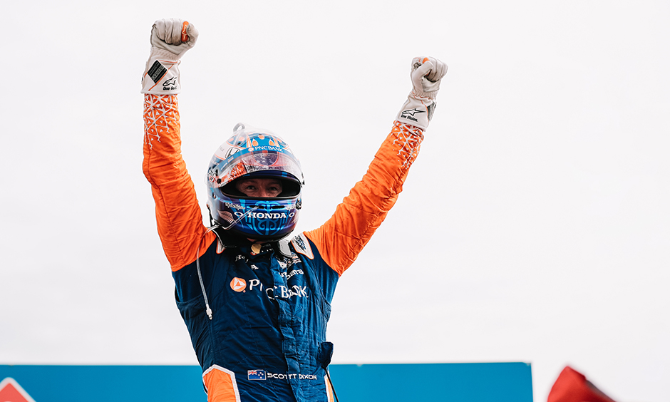 Scott Dixon celebrates his win