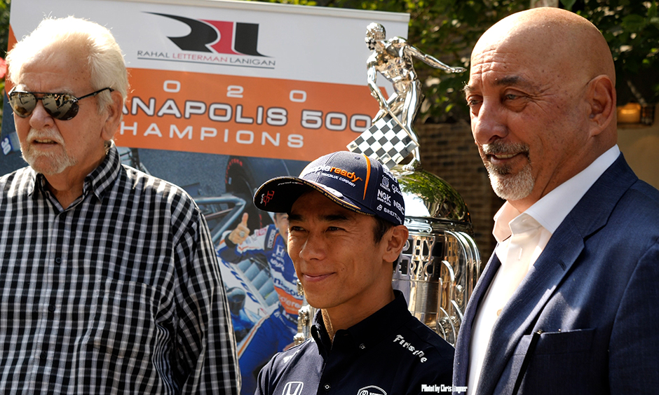 Mike Lanigan, left, Takuma Sato, center, and Bobby Rahal