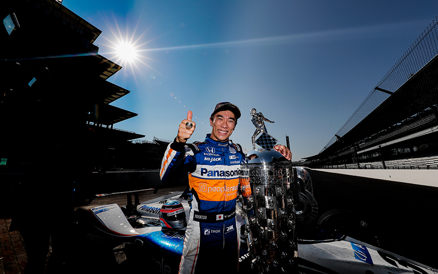 Takuma Sato with the Borg-Warner Trophy after winning the Indy 500. 