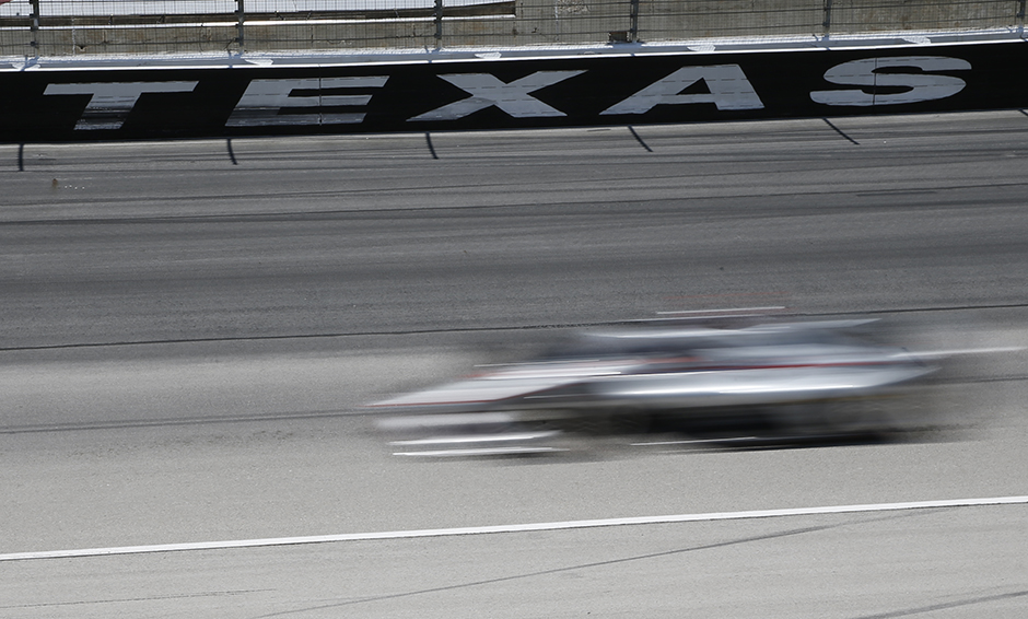 A car at speed at Texas Motor Speedway