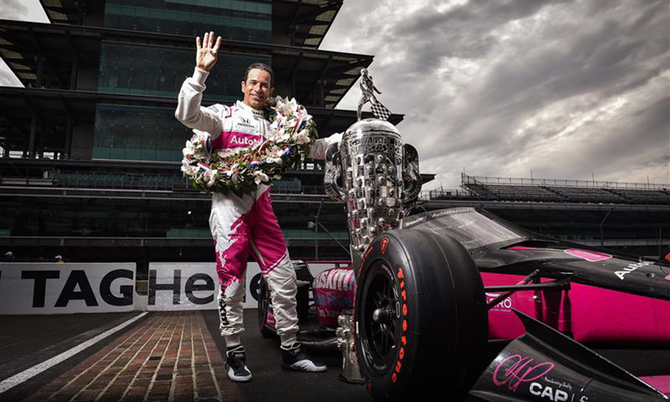 Helio Castroneves at the traditional winner's photo shoot