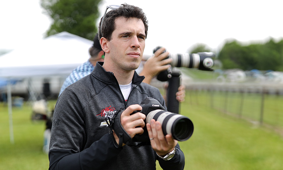 Dalton Kellett shooting photographs at Road America