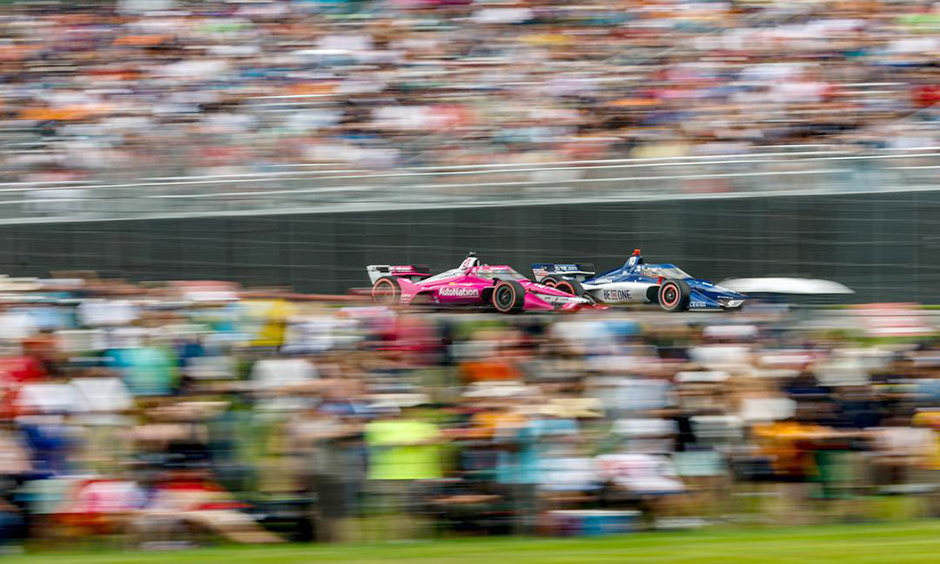 Kyle Kirkwood and Alex Palou dueling at Mid-Ohio.